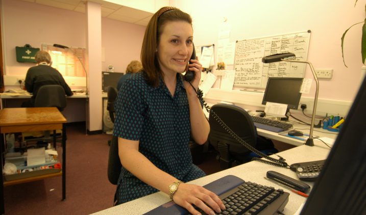 typist-female-on-phone