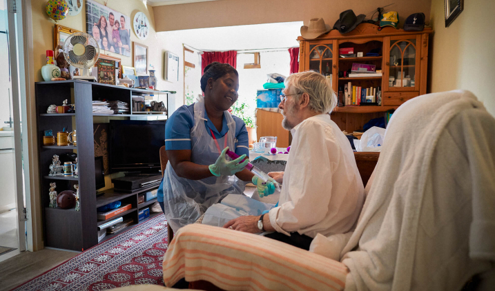 community nurse wth patient