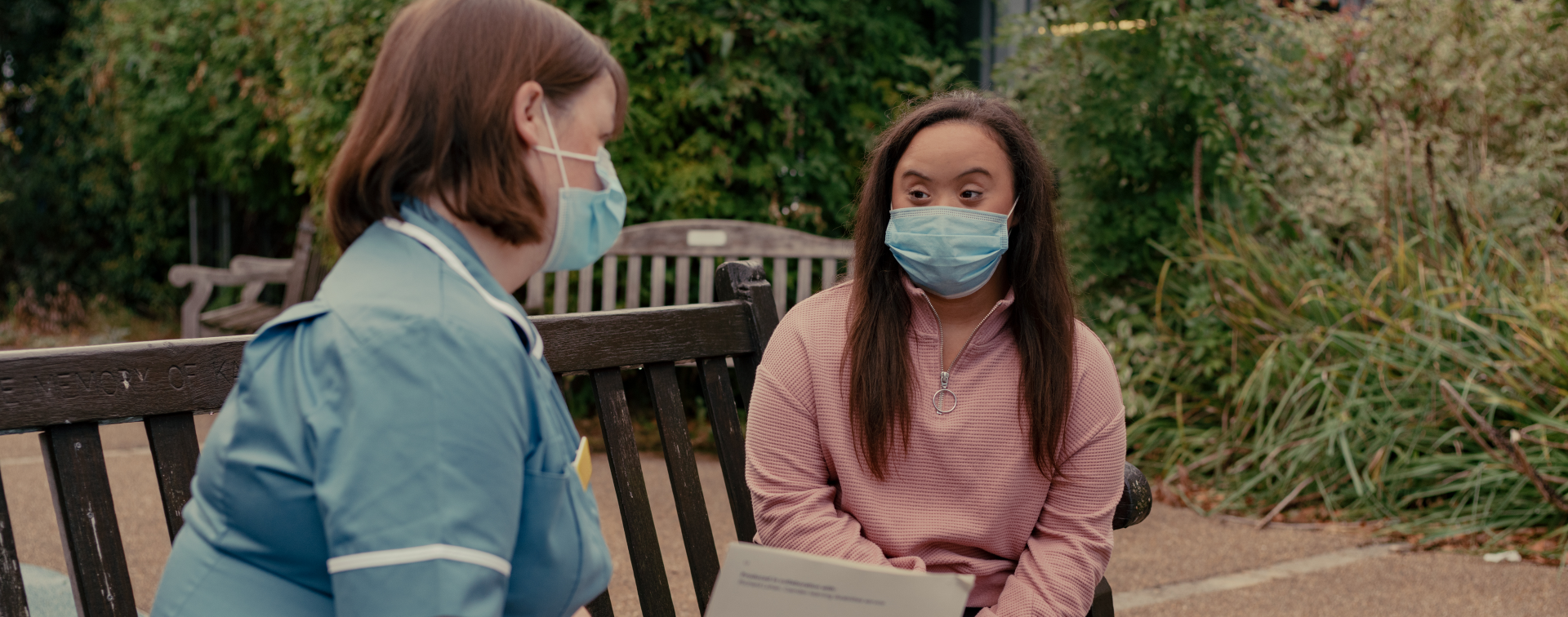 nurse talking to patient