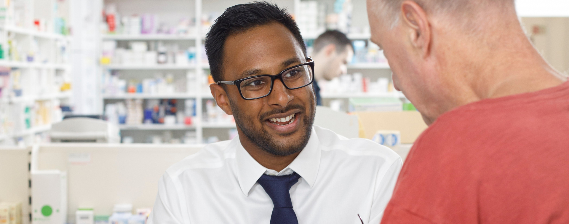 pharmacist with patient
