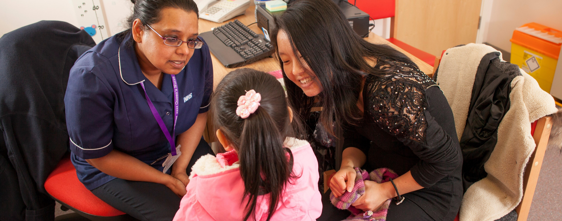 public health nurse talking to family